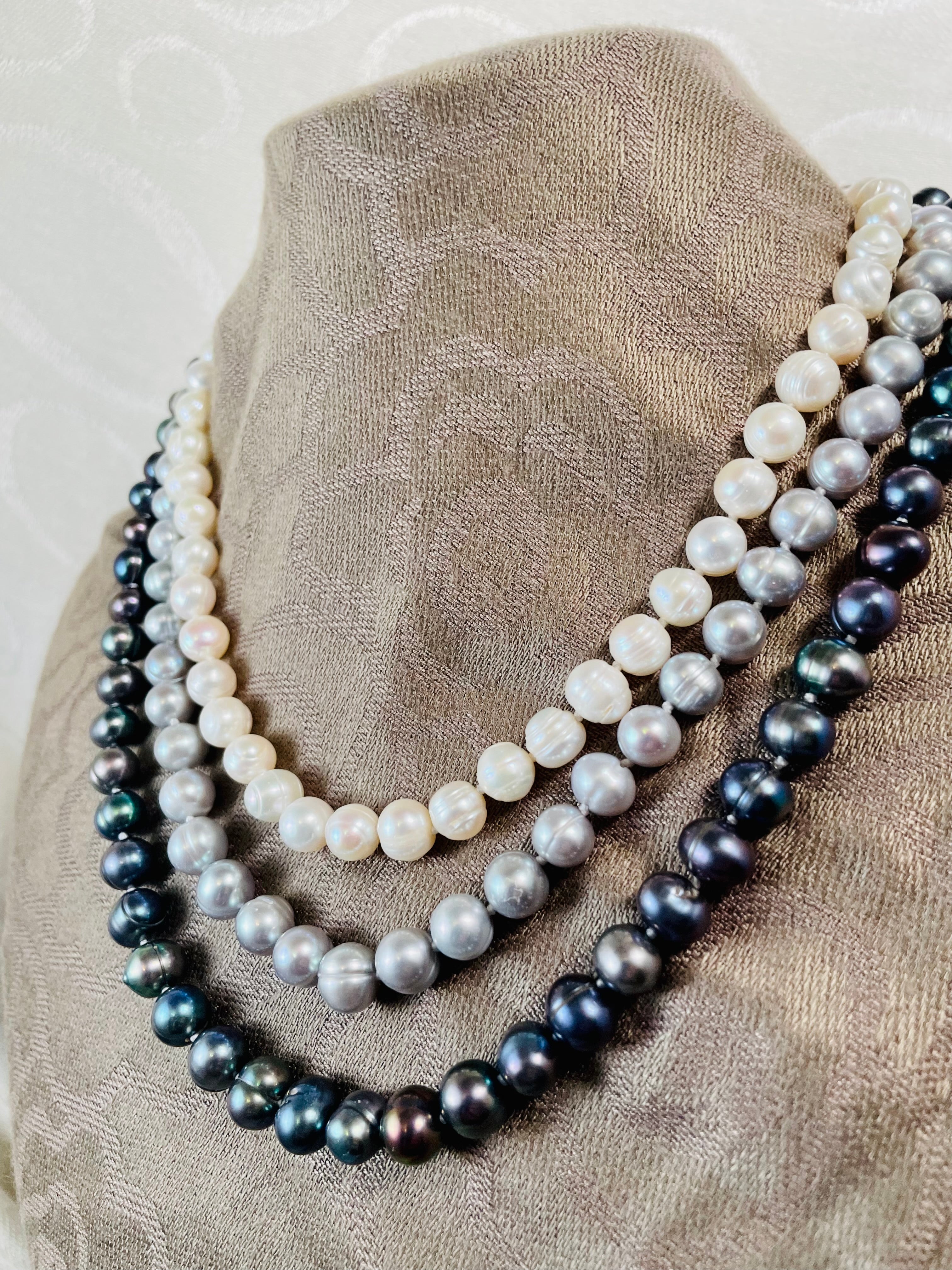 Triple strand ombré white, silver, and peacock pearl necklace