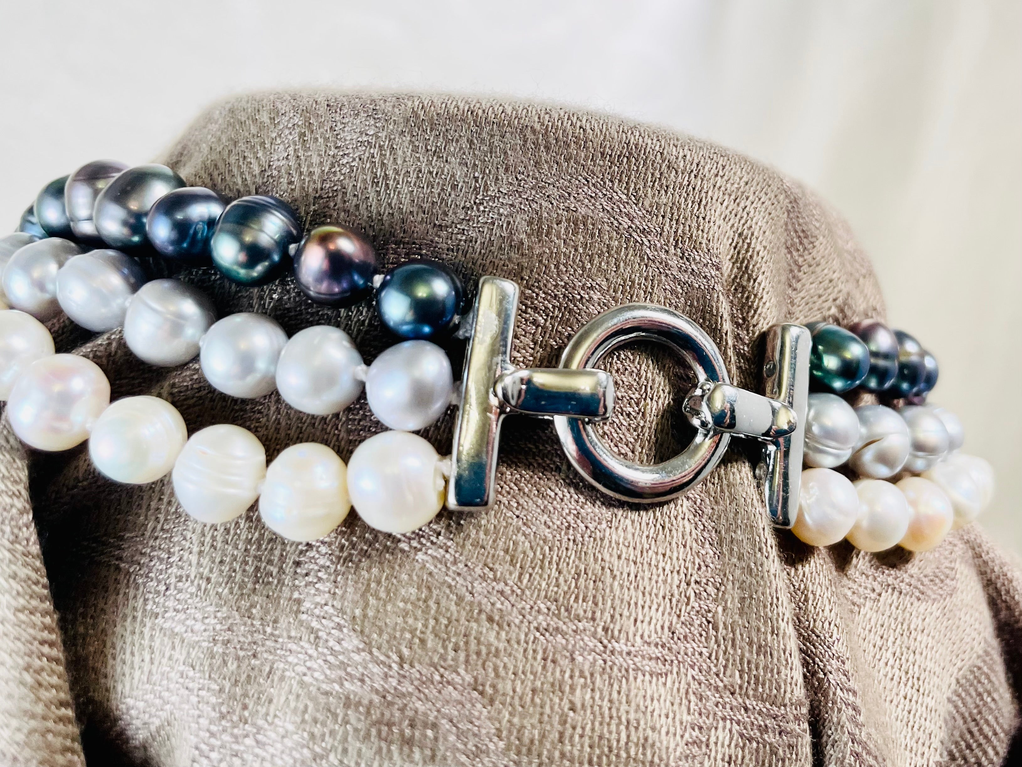 Triple strand ombré white, silver, and peacock pearl necklace